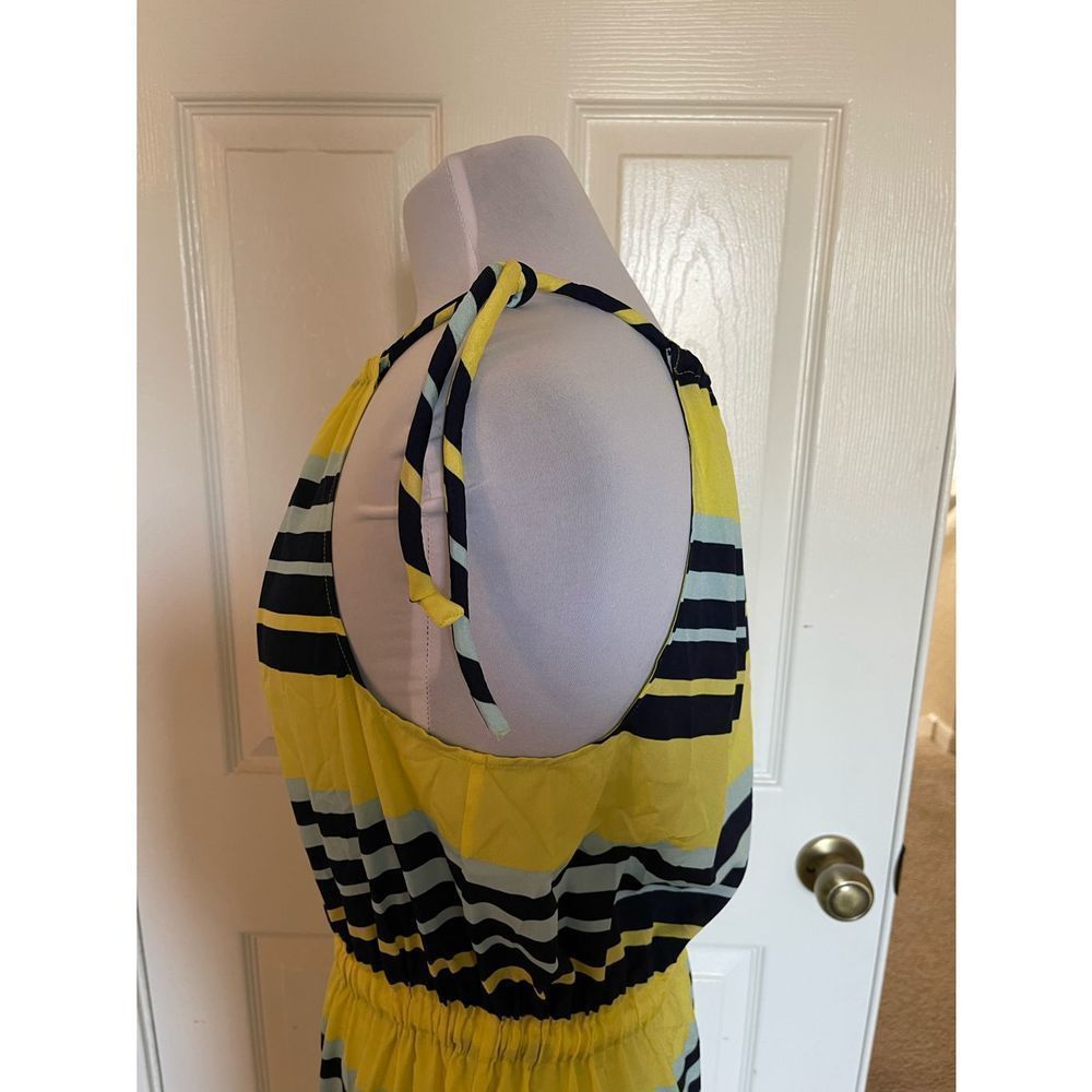 Yellow and blue striped sleeveless dress.